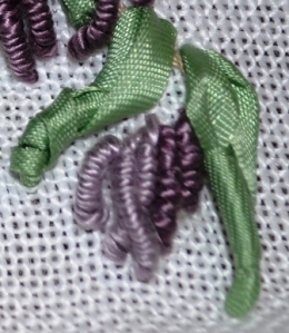 Close up of chain stitch with bullion ending tip